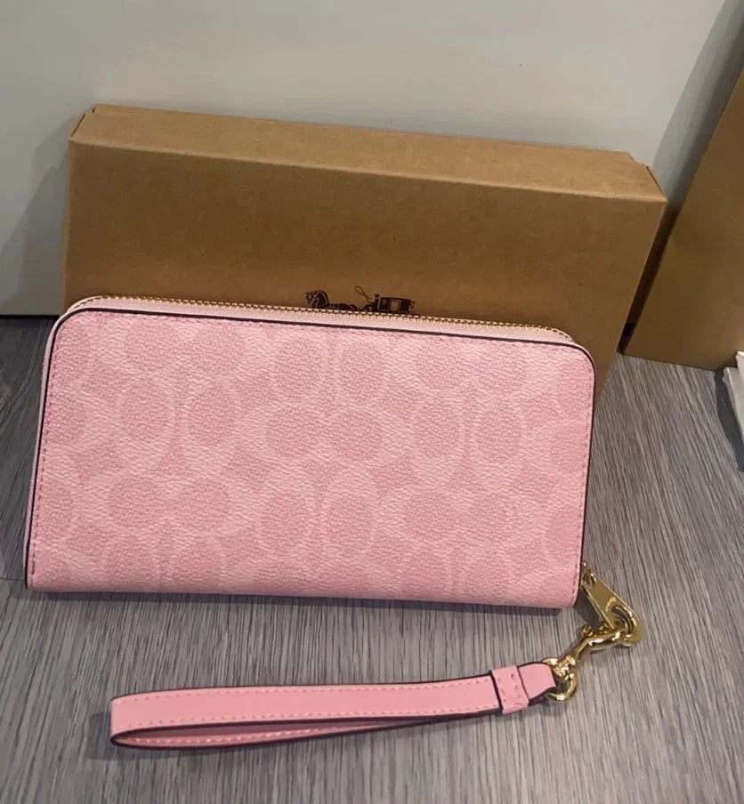 Coach Signature Canvas Zip-Around Wallet Pink