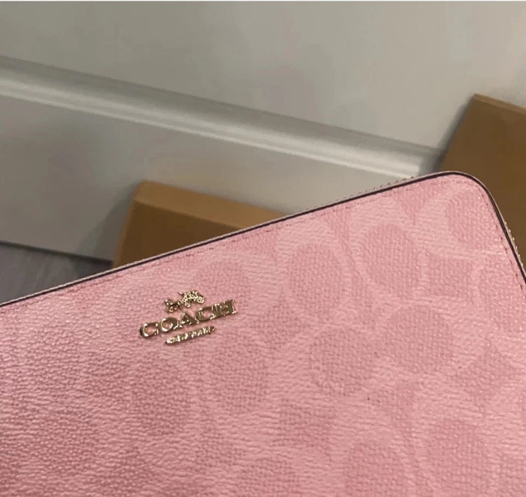 Coach Signature Canvas Zip-Around Wallet Pink