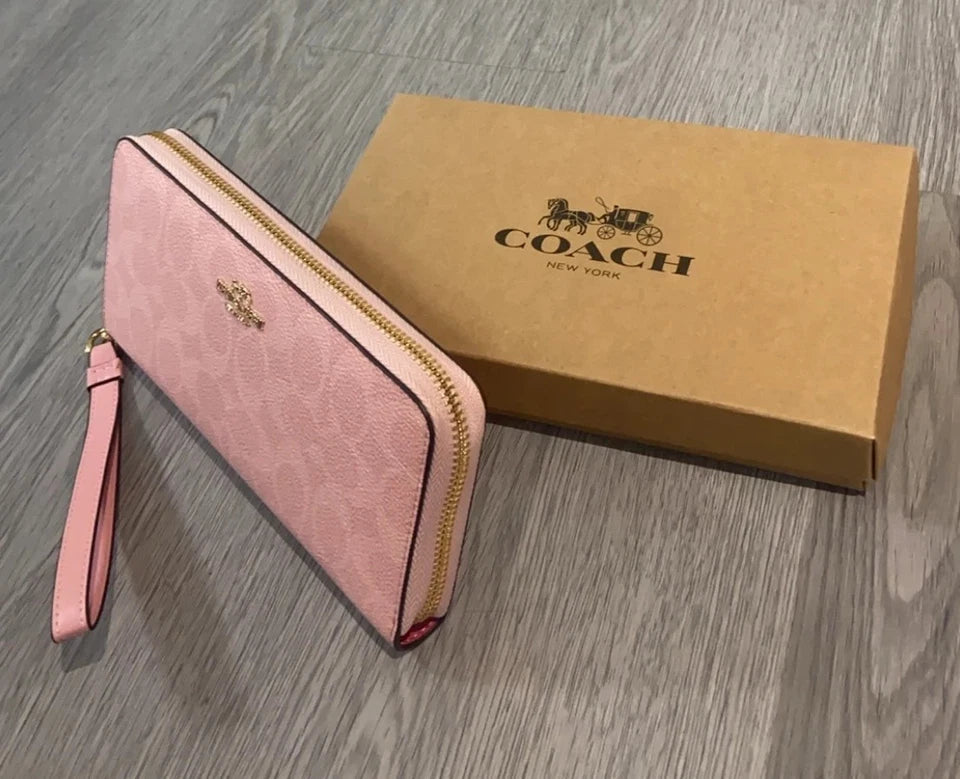 Coach Signature Canvas Zip-Around Wallet Pink